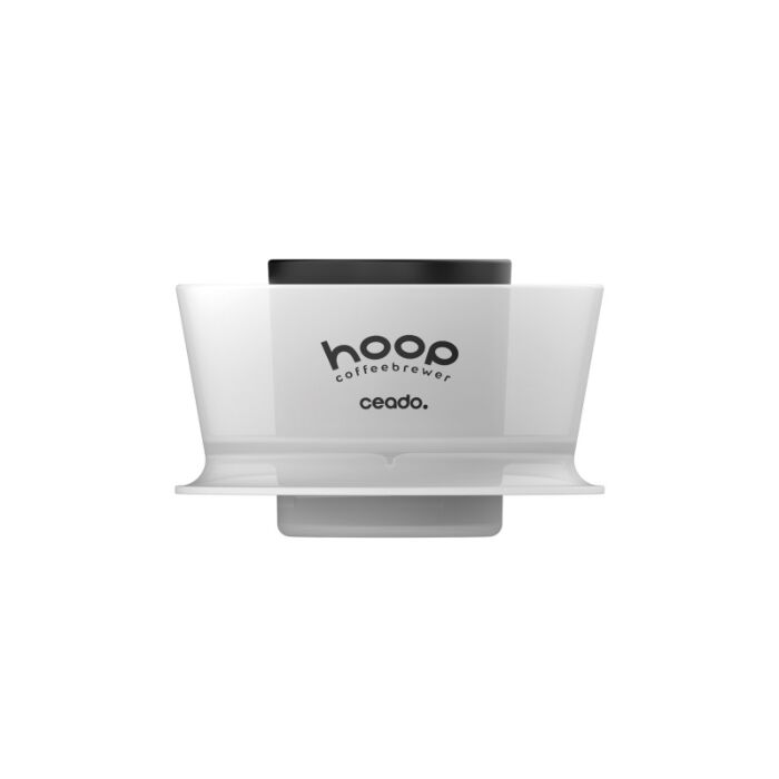 White coffee brewer with black lid on a white background